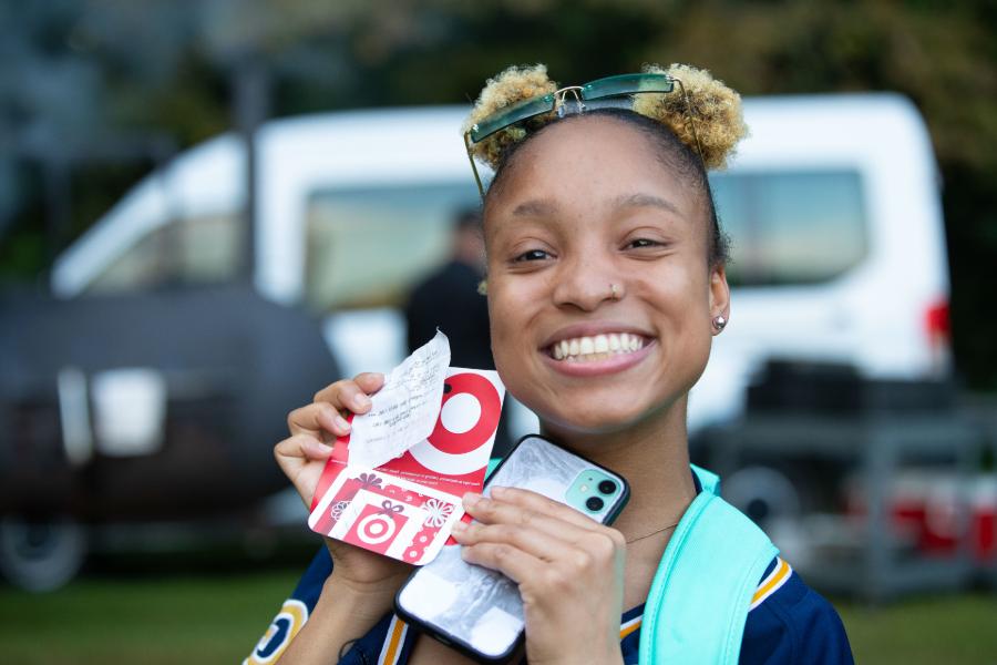 female student smiling outside